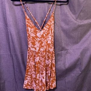 burnt orange and flowered romper S
